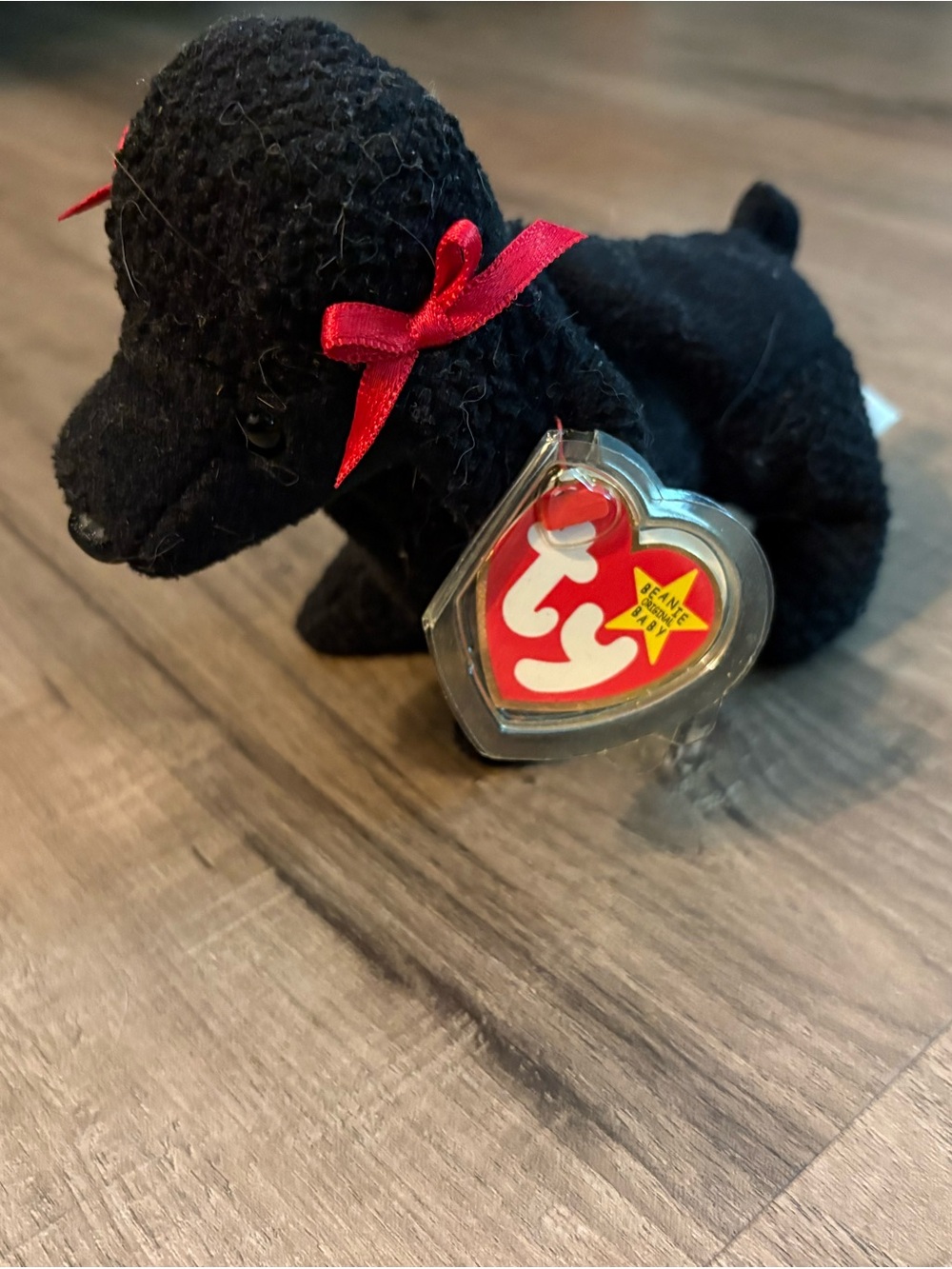 RARE!!! Beanie baby, Gigi, almost completely new, has all tags and tag protector